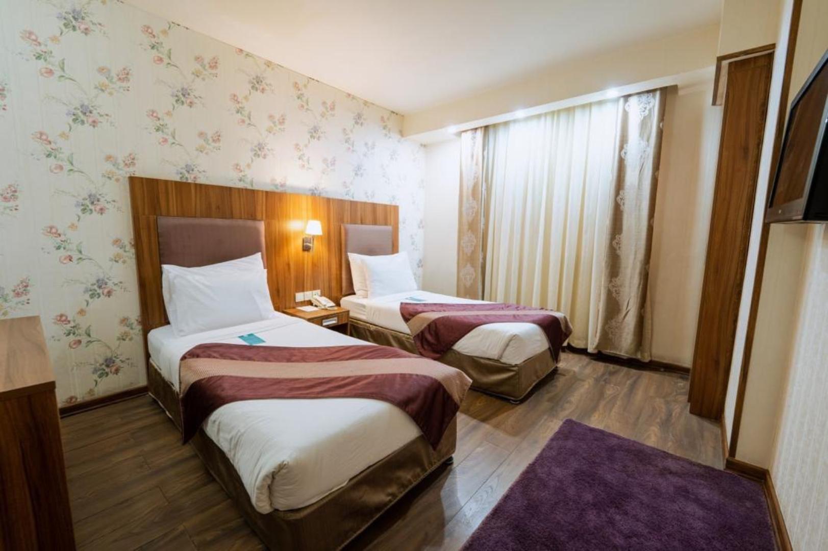 هتل پارسیان شیراز فضای داخلی اتاق‌ها