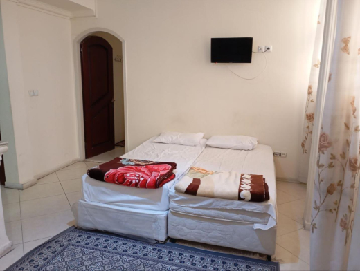 خانه مسافر آل رضا مشهد فضای داخلی اتاق‌ها