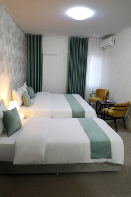 هتل ایران زمین تهران فضای داخلی اتاق‌ها