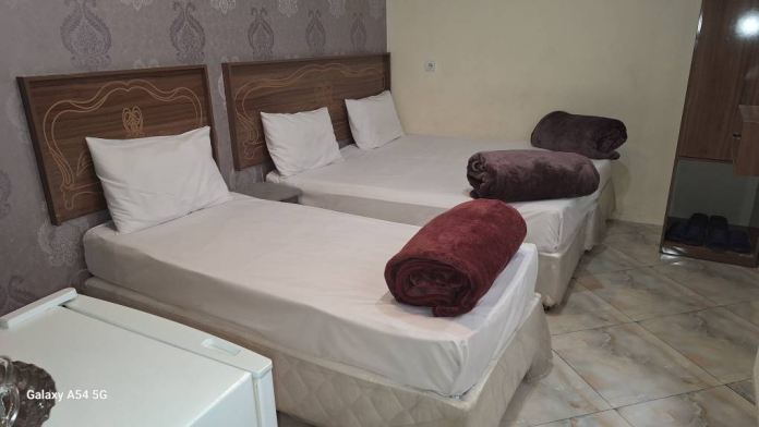 خانه مسافر کرامت مشهد فضای داخلی اتاق‌ها