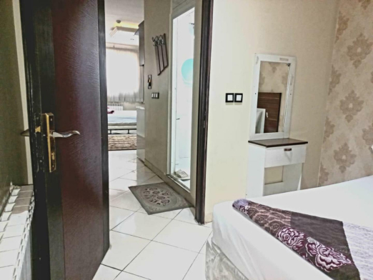 خانه مسافر محبی نسب مشهد فضای داخلی اتاق‌ها 1