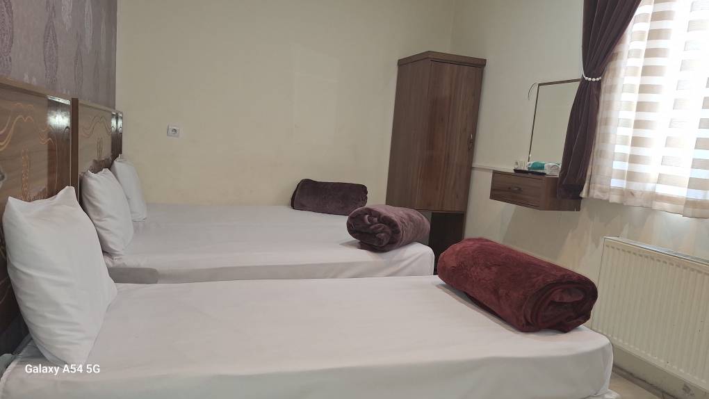 خانه مسافر کرامت مشهد فضای داخلی اتاق‌ها