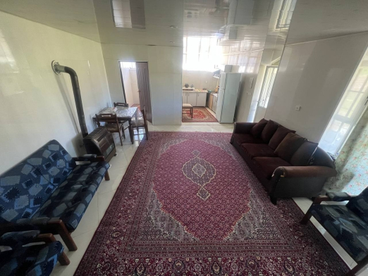 اتاق پذیرایی سوئیت یک خوابه کلبه جنگلی علافان