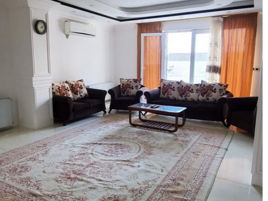 اتاق پذیرایی آپارتمان دوخوابه نزدیک به دریا