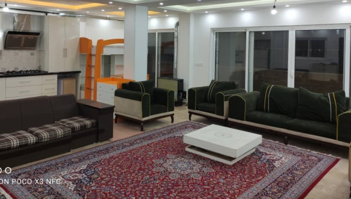 اتاق پذیرایی واحد یک خوابه ساحلی