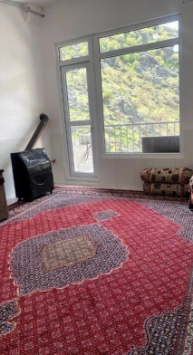 اتاق پذیرایی سوئیت دنج در روستای گردشگری پالنگان