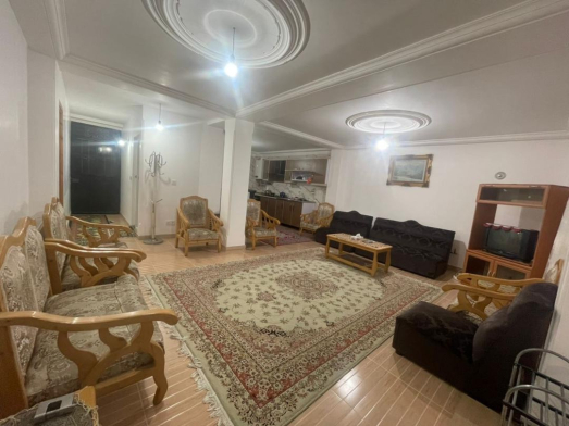 اتاق پذیرایی ویلای یک خوابه با دسترسی به باغ پرتقال