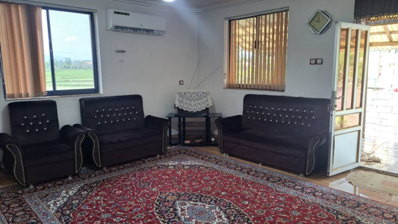 اتاق پذیرایی منزل ویلایی دربست با ویو شالیزار و جنگل